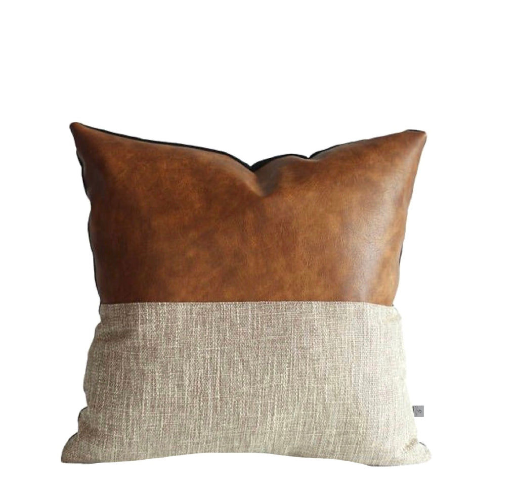 A Custom feather inner scatter cushion 60x60 each Safari leather collection